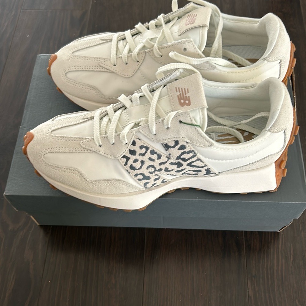 Brand new. New Balance 327 Leopard size 8.5